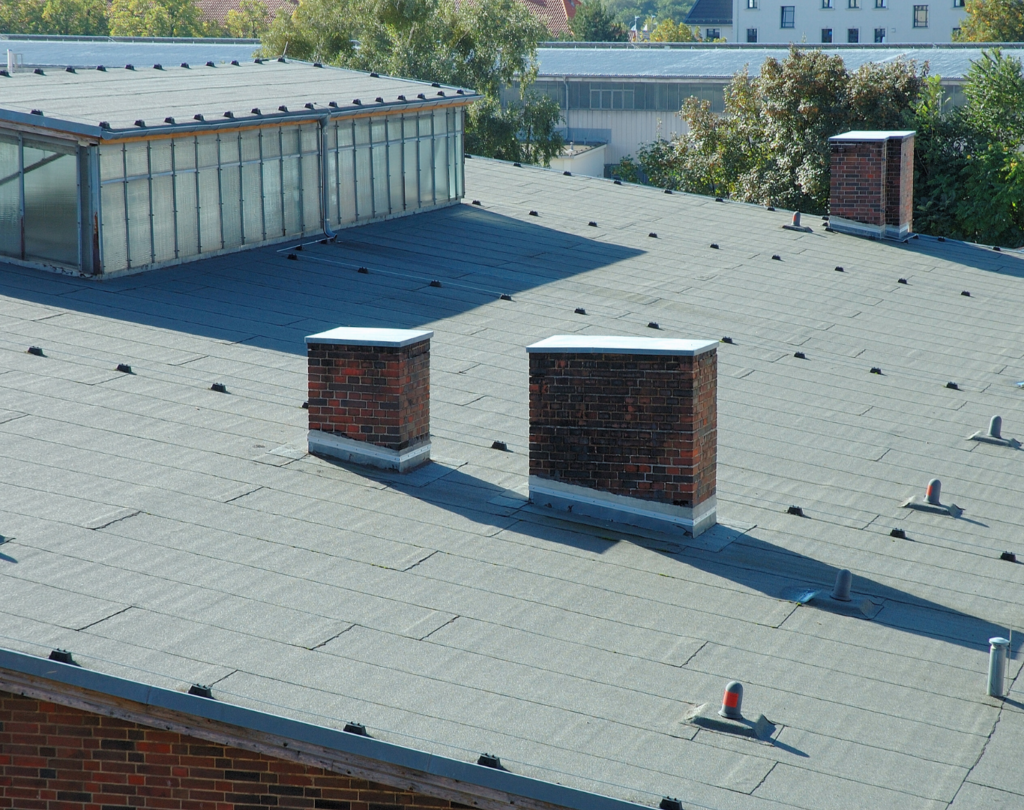 Completed flat roof showcasing TPO Roofing in Hewitt, TX installed for energy efficiency and long-term durability